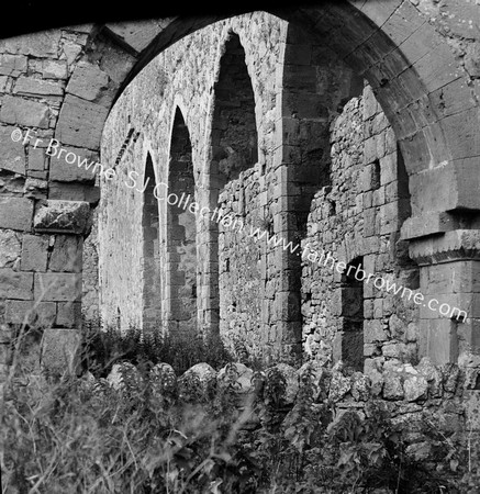 ARCADE OF S.AISLE THROUGH HALF BLOCKED E.ARCH OF S.AISLE (OR TRANSEPT) LOOKING W.